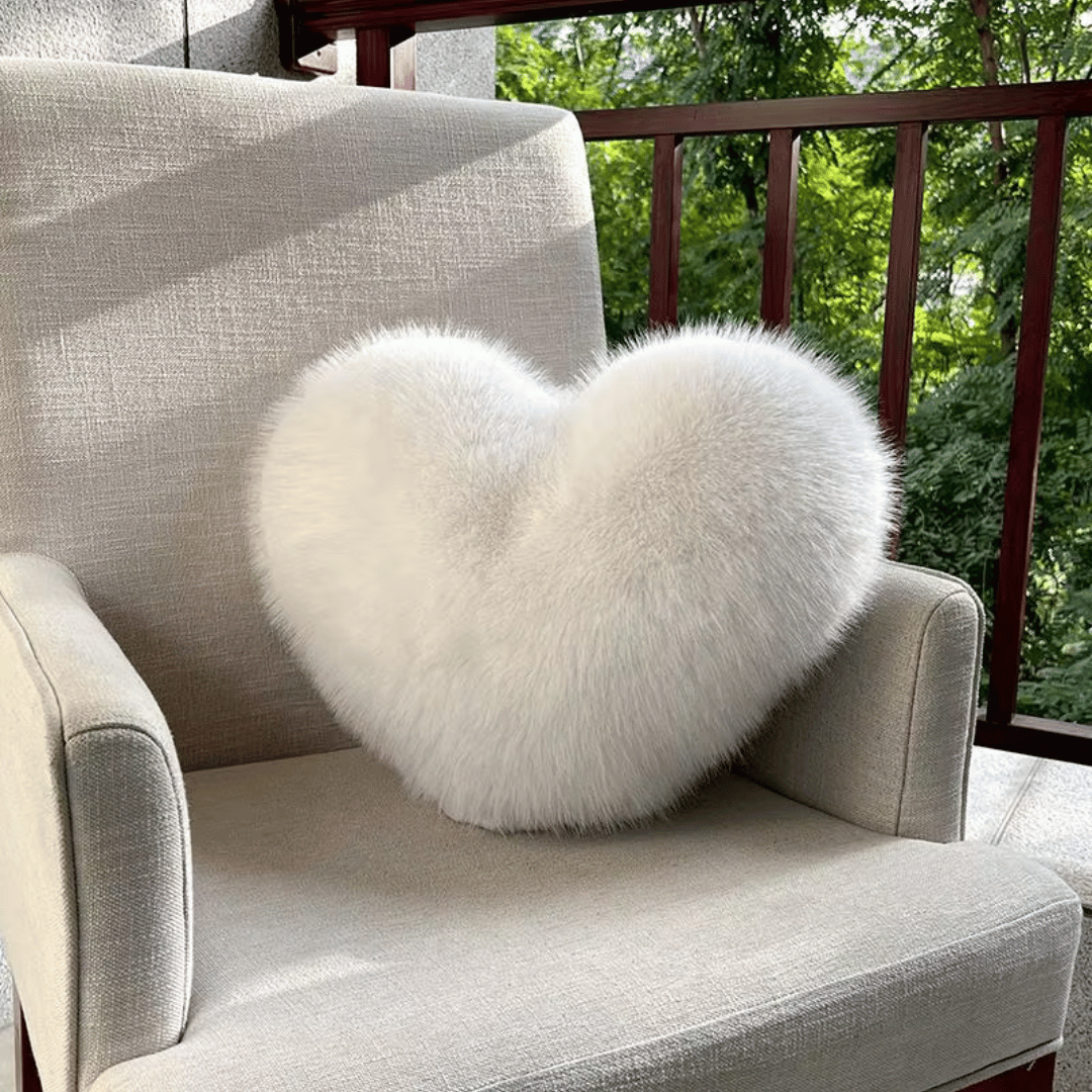 Heart-shaped faux fur pillow for warm & modern living spaces