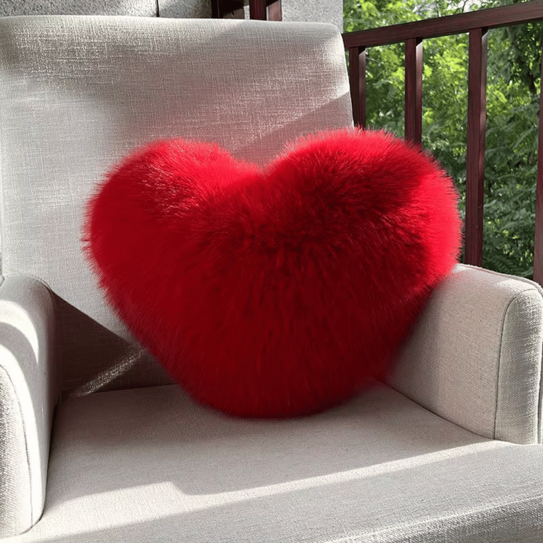 Heart-shaped faux fur pillow for warm & modern living spaces