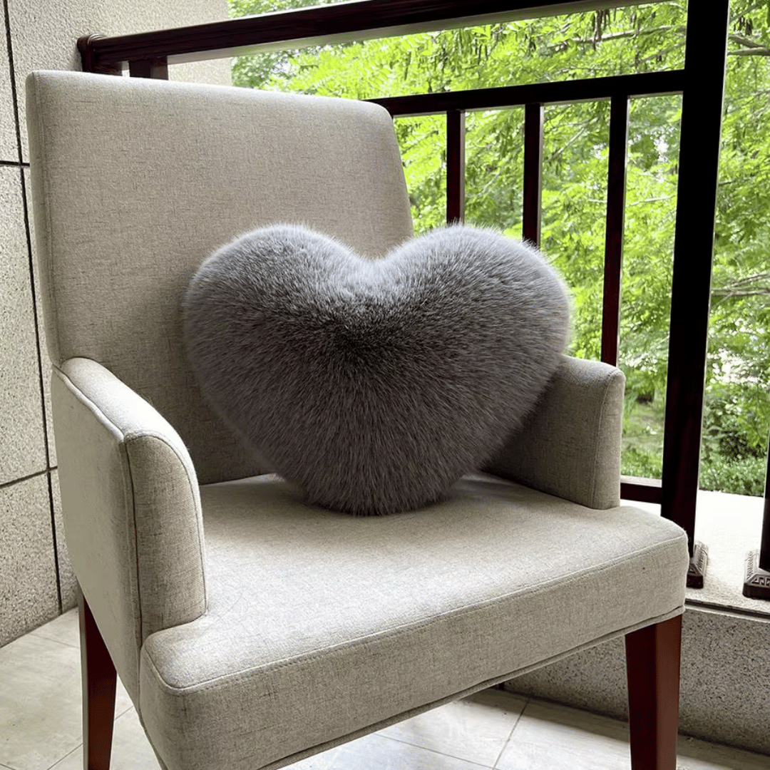 Heart-shaped faux fur pillow for warm & modern living spaces