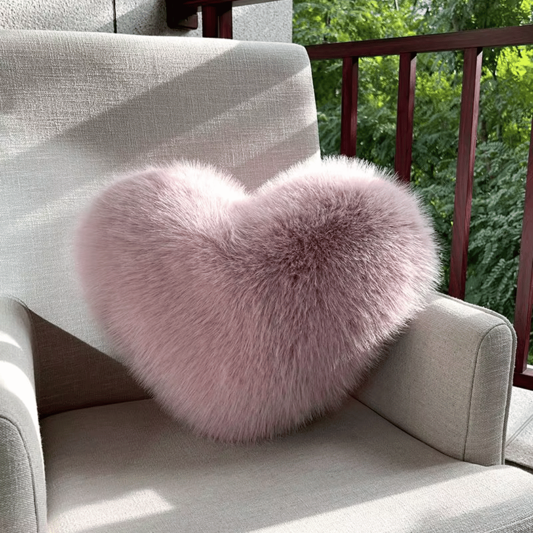Heart-shaped faux fur pillow for warm & modern living spaces